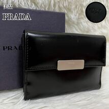 1円〜　美品　PRADA プラダ　折り財布　銀金具　ロゴ金具　フラップ　レザー　男女兼用　フラップ　希少　ブランドロゴ　付属品付き_画像1