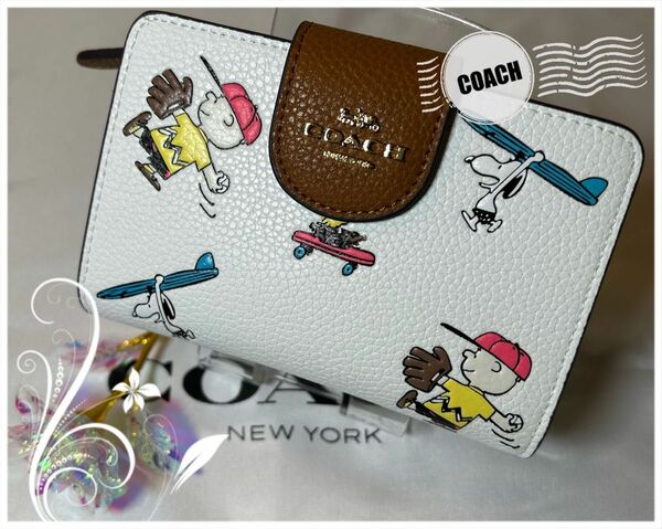 COACH 二つ折り財布 PEANUTS スヌーピー チョークマルチ C4899