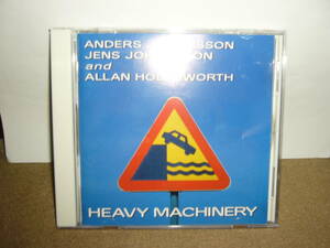 巨匠故Allan Holdsworth参加　Johansson兄弟幻のプロジェクト 大傑作「Heavy Machinery」 国内盤中古。日本盤のみ楽曲含む。