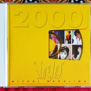 ☆彡名盤【CD】中島みゆき / SINGLES 2000 →糸・ファイト・瞬きもせず・命の別名・旅人のうた・空と君のあいだに・地上の星・愛情物語の画像1