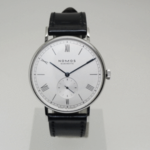NOMOSno Mothra do wig silver face LD1A2W238(234) hand winding reverse side ske glass hyute used wristwatch free shipping!!