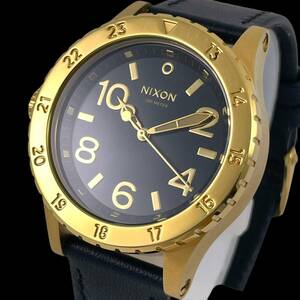 24E045 Nixon NIXON THE38-20 quarts 200M stainless steel leather belt Gold × black face men's wristwatch 1 jpy ~