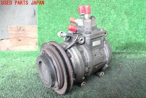 5UPJ-10446025]ランクル70系(HZJ77V)エアコンコンプレッサー 中古