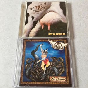 CD2枚セット エアロスミス AEROSMITH 【国内盤 初回盤 帯付 GET A GRIP ゲットアグリップ MVCG-108】【輸入盤 NINE LIVES ナインライヴス】