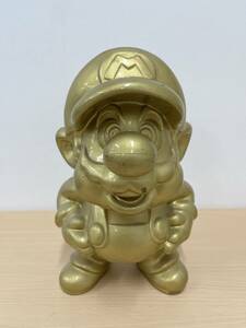 [2342] nintendo store for display gold. Mario image not for sale 