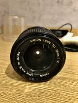 Canon lens FD 28mm F1.4 プロテクター付_画像1