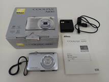 3139 ★ ニコン Nikon COOLPIX A100 コンパクトデジタルカメラ デジカメ シルバー 中古 通電確認済み 動作未確認 経年保管品_画像1