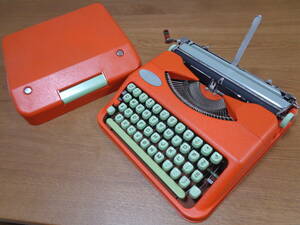 .. goods HERMES Baby Hermes Bay Be typewriter 1957 year made pop style . orange color 