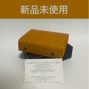 ①ナポリ【新品未使用】m+ エムピウ ミッレフォッリエ2 P25 革財布 折り財布　コンパクト財布　イエロー系　黄色系　人気色　