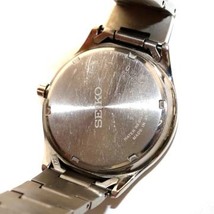 セイコー SEIKO ソーラー SOLAR 腕時計 ウォッチ クオーツ アナログ 3針 チタン デイト 黒文字盤 シルバー色 V157-0BX0 SBPX103_画像5