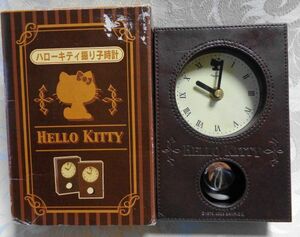 * Hello Kitty ^!... clock Brown 