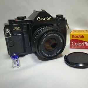 美品完動品Canon 一眼レフ フィルムカメラ A-1 ニューFD 50mm f1:2 電池　新品フィルム付き　作例あり