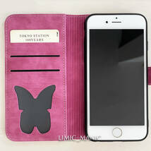 iPhone 6 6s 7 8 SE (第2世代/第3世代) SE2 SE3 ケース スマホ 手帳型 カードケース マゼンタ 赤系 猫 CAT ねこ 蝶 エンボス加工_画像2