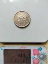 一円銀貨 明治10年　貿易銀　一圓銀貨　 本物保証 　直径約38.7mm　重さ約27.2ｇ_画像5