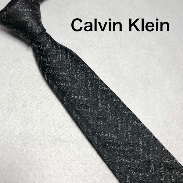 【Calvin Klein】カルバンクライン ナロータイ ネクタイ ロゴグラム ブラック 光沢 イタリア製