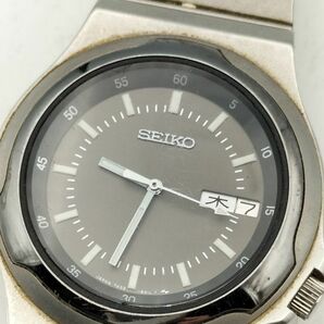 S38 三 不動品 1円～ セイコー 7433-6010 デイデイト クオーツ メンズ 腕時計 シルバーカラー 黒文字盤の画像1