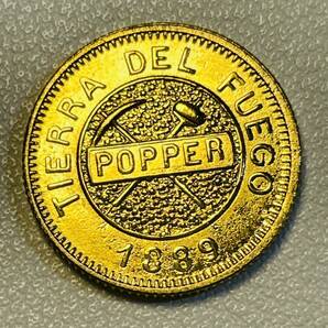 アルゼンチン 硬貨 古銭 ティエラ・デル・フエゴ 1889年 ピック ハンマー グラモス 鉱物土壌 記念幣 コイン 重3.74gの画像1
