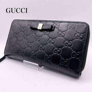 美品【至高の逸品】GUCCI 長財布 シマレザー ラウンドジップ リボン インターロッキング 黒 グッチ レディース ゴールド金具 メンズ