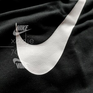 新品 正規品 NIKE DRI-FIT ナイキ ドライフィット スウェットパンツ ジョガーパンツ テーパード スウッシュ プリント 黒 ブラック 白 XLの画像3