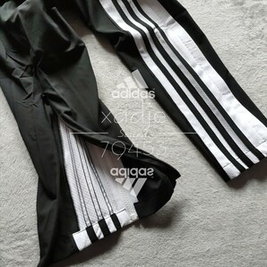 新品 正規品 adidas アディダス サイドファスナー付き ジャージ パンツ 三本ライン テーパード 黒 ブラック ロゴ プリント XLの画像3
