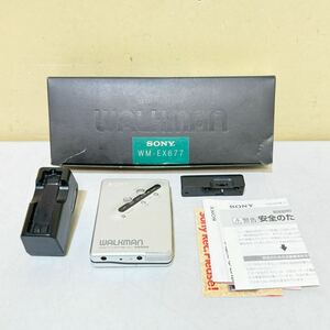 SONY WALKMAN WM-EX677 cassette Walkman portable cassette player silver Sony Walkman box attaching Junk 