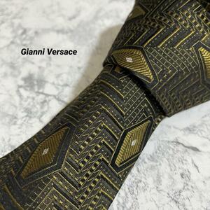 1円　激レア Gianni Versace ジャンニヴェルサーチ　ブランドネクタイ シルク100％ 入手困難　絹　総柄　黒　金　ビジネススーツ