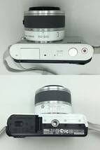 RR54♪＜通電/動作/精度未確認＞ジャンク デジタルカメラ Nikon ニコン J1 ホワイト 10-30mm 1:3.5-5.6 VR φ40.5 冊子付き 現状品♪_画像4
