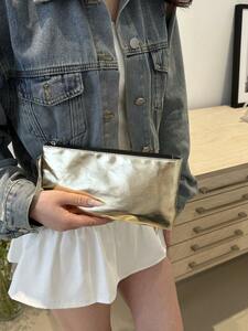  lady's bag clutch bag glistening surface. embe rope style. Mini bag, in stock with strap .., mobile telephone . coins etc.. 