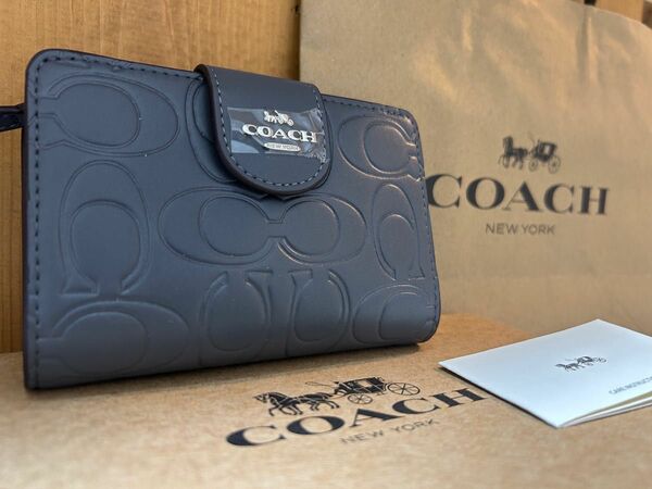 新品未使用 coach コーチ 二つ折り財布 キルティング シグネチャー グレー