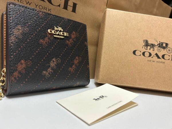 6 新品未使用 coach コーチ 二つ折り ミニ財布 馬車柄 ブラウン