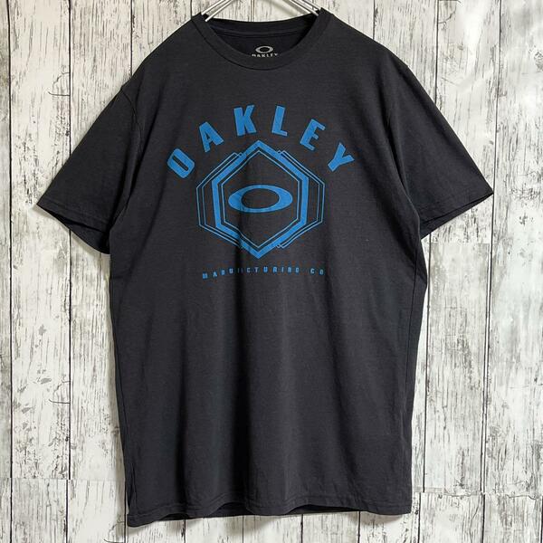 OAKLEY オークリー Tシャツ M 炭黒系 ビッグロゴ 古着 半袖 HTK4027