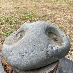 . stone large . river . discovery was done Mars person. head garden stone 