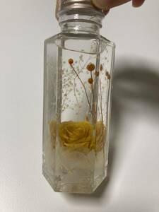  herbarium glass bottle small bin rose yellow rose . charcoal seems to be yellow decoration 