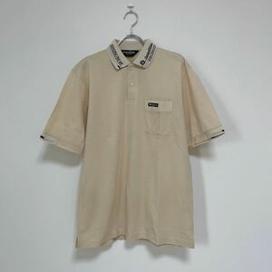 Munsingwear grandslam Munsingwear wear Grand s Ram men's polo-shirt with short sleeves Golf wear ivory made in Japan size L beautiful goods kli ending 