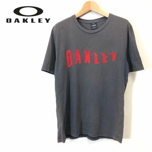 G744-F◆ OAKLEY オークリー 半袖Tシャツ カットソー ロゴプリント トップス ◆ sizeM コットン ブラック 古着 メンズ 春夏