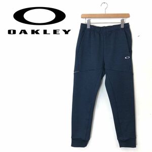 G1584-G* прекрасный товар *OAKLEY Oacley брюки *sizeL темно-синий одноцветный мужской низ длинные брюки джерси талия резина one отметка простой 