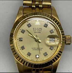 05th エルジン デイト クォーツ デラックス デイト 腕時計 ゴールドカラー 未稼働品 同梱NG