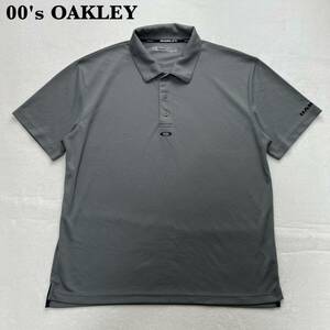 【y2k】00's OAKLEY センターロゴ ポロシャツ メタルボタン