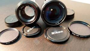 AF|NIKKOR85 millimeter 1:1,8 lens |NIKKOR50 millimeter 1:1,4 lens . summarize 2 point image verification 