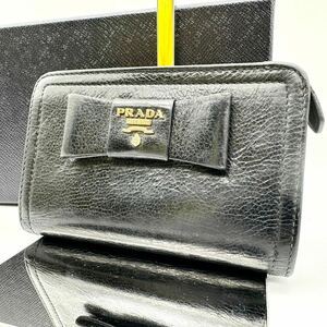 美品● PRADA プラダ 二つ折り財布 ブラック リボン ゴールドロゴ レディース