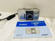 A2028 Konica カメラ Lexio 70 コンパクト フィルムカメラ コニカ 全自動 オートフォーカス シルバー 28-70mm/F3.4-7.9 動作未確認_画像1