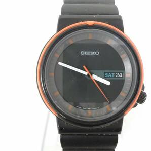 SEIKO セイコー 7433-600A クォーツ腕時計/ダブルカレンダー/リストウォッチ/デイデイト/ブラック×オレンジ/ラウンドフェイス/04KO042805の画像1