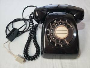  black telephone Japan electro- confidence telephone . company 600-A1* optical circuit .. reception * telephone call verification *