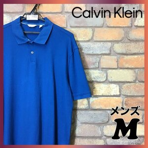 ME4-945★USA買付★正規品★【Calvin Klein カルバンクライン】左袖メタルロゴ付 半袖 ポロシャツ【メンズ M】青 裾タブ 上質 アメリカ古着