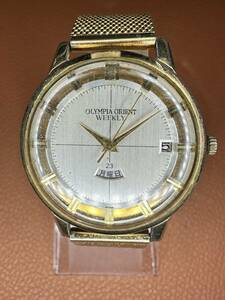 OLYMPIA ORIENT WEEKLY DAY/DATE OGF
