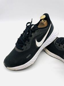  impact price![ strongest sport model!] put on footwear feeling eminent! strongest 1 pair![NIKE Revolution 5] fine quality running shoes / black white /jp25cm