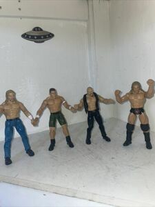 (4) 1999 WWF Titan Tron Live Jakks Pacific Triple H/stone Cold/john Cena Figures 海外 即決