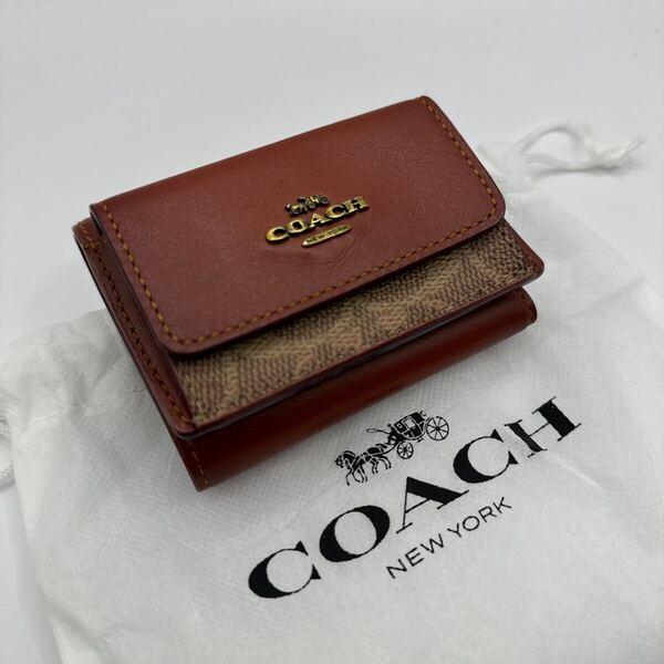 ★送料無料★新品★正規品★COACH(コーチ)/三つ折り財布/ミニウォレット/コンパクト財布/小銭入れ/ブラウン系/シグネチャー柄/85031 B4NQ4