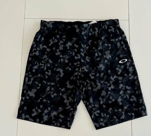 オークリー　ＯＡＫＬＥＹ　ＡＤＤＩＣＴＩＶＥ　ＳＨＯＲＴＳ　５．０　ＦＯＡ４０５１６８　(ＢＬＡＣＫ ＰＲＩＮＴ)　ＸＬ