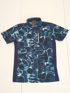 オークリー　ＯＡＫＬＥＹ ＳＩＮＵＯＵＳ ＧＲＩＤ ＳＨＩＲＴ　ＦＯＡ４０２５０１　(ＢＬＵＥ ＳＴＯＲＭ ＰＲＩＮＴ)　Ｌ